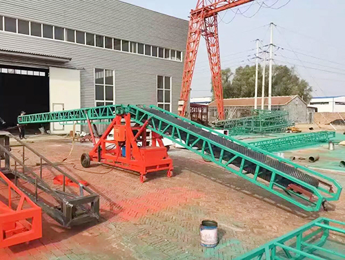 Telescopic double wing conveyor